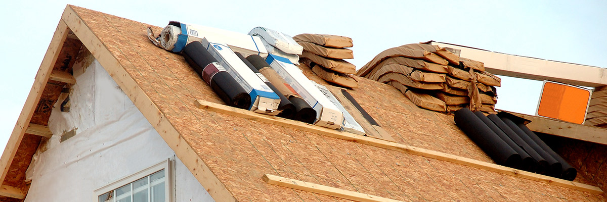 roofing work being done on a residential home